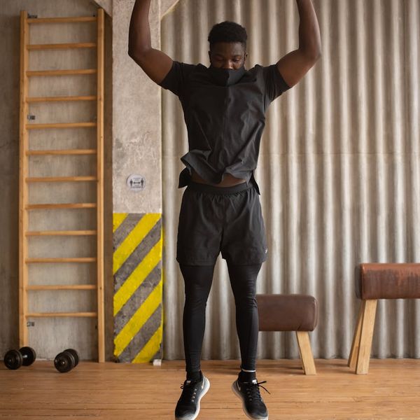 Person feeling energized and balanced after a light cardio session, smiling lightly.